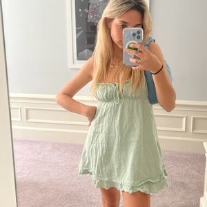Mini green dress.